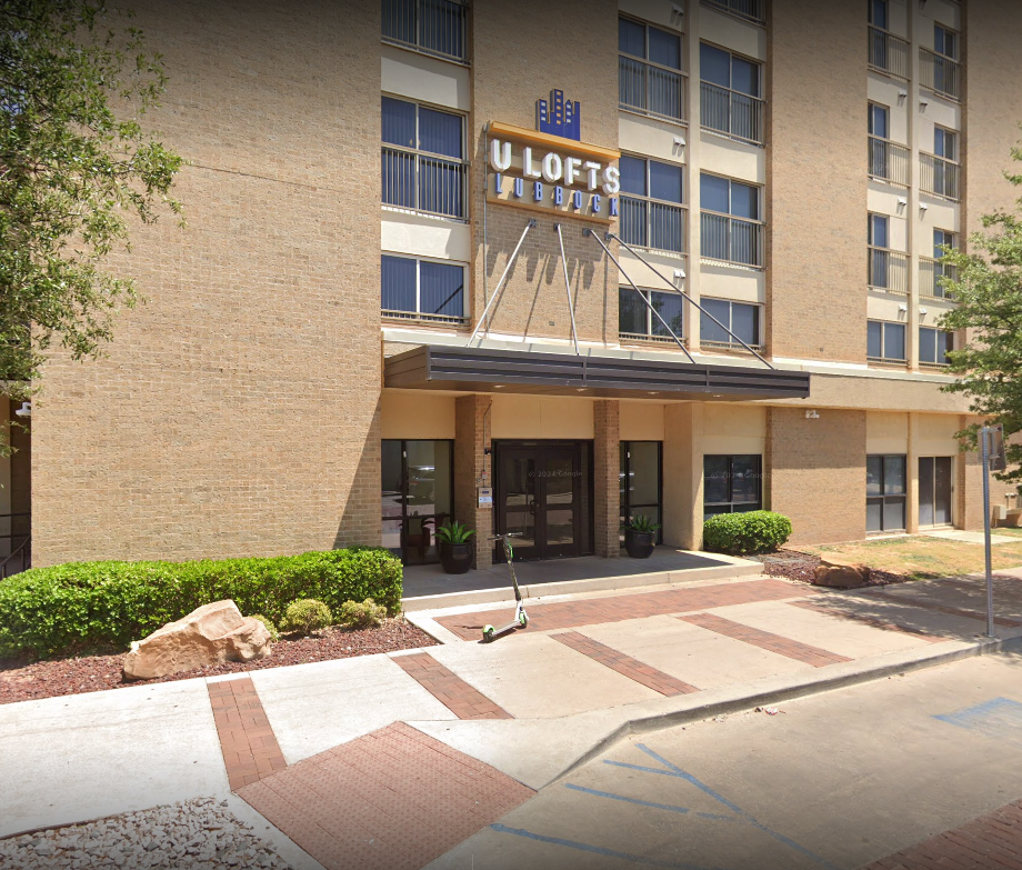 Modern building entrance with signage